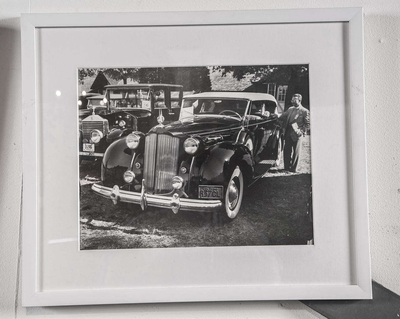 Set of 9 framed original photographs of 1920's cars.