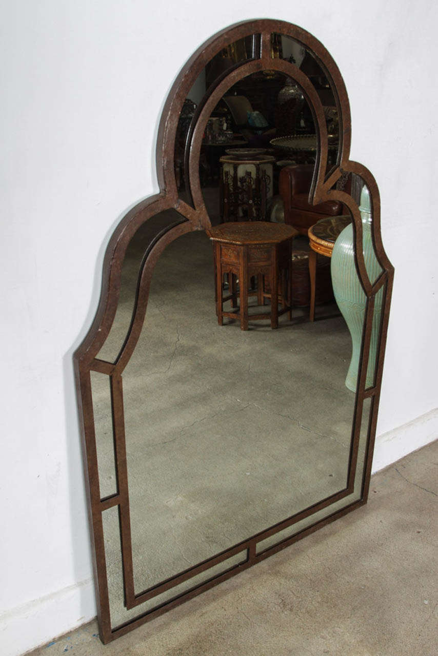 Moorish style mirror that will work with any Orientalist decor or traditional decor. 
Handcrafted by skilled artisans in Spain.
Rust antique color finish on iron.