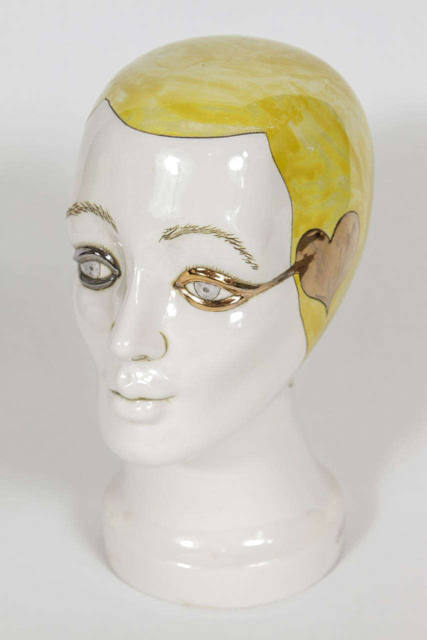 Celeb Baxis series head by Lukman Glasgow from 1973. Painted, glazed ceramic signed 