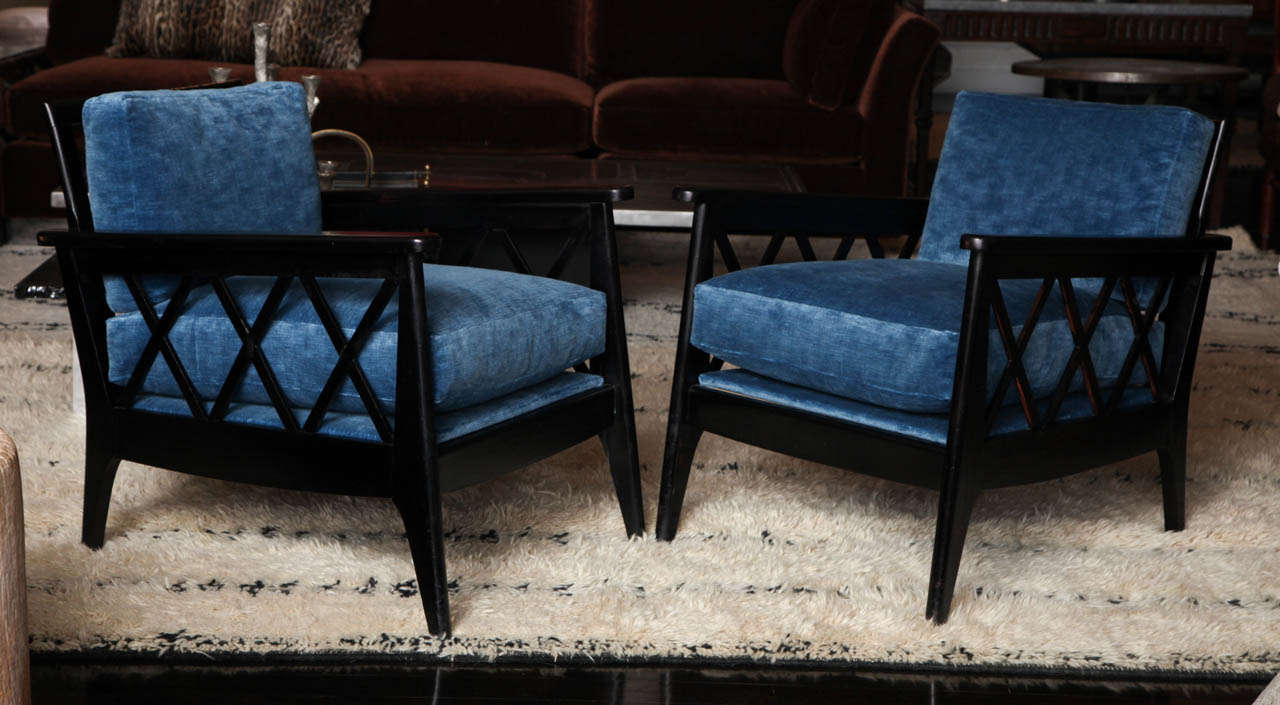 Royere style chairs with black painted wood frame with deep cerulean velvet upholstery.