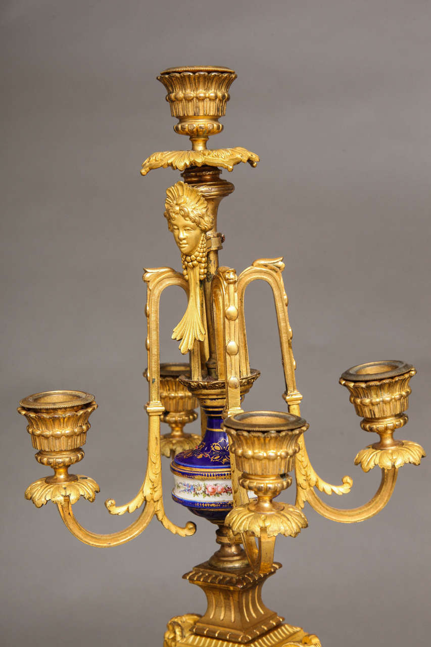 Sèvres Royal Blue Porcelain and Ormolu-Mounted Three-Piece Clock Garniture In Good Condition For Sale In New York, NY