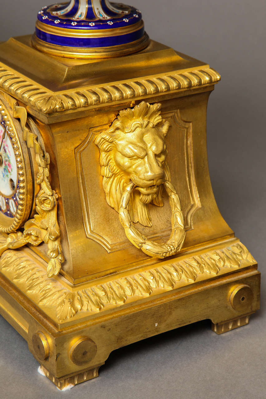 19th Century Sèvres Royal Blue Porcelain and Ormolu-Mounted Three-Piece Clock Garniture For Sale