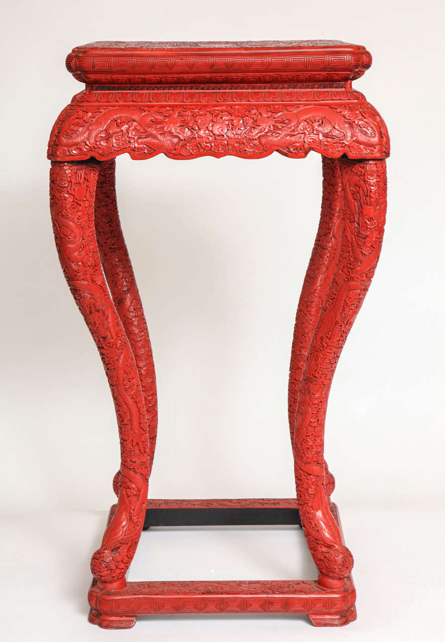 Pair of antique Chinese hand-carved Red Cinnabar square shaped stands/pedestals. Each amazingly hand-carved with Imperial dragons all over and on tops, late 1800s-early 1900s, Republic period. Provenance: Private collection Washington DC Diplomat.