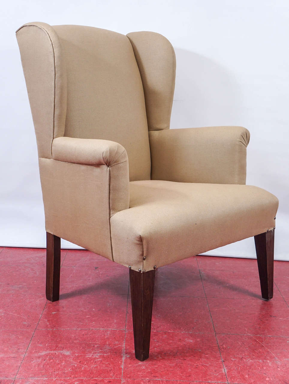 These wing chairs, although on the smaller side, have great comfort without taking up a lot of room.  Brown stained legs and new cafe au lait linen upholstery.  

Arm height:  26