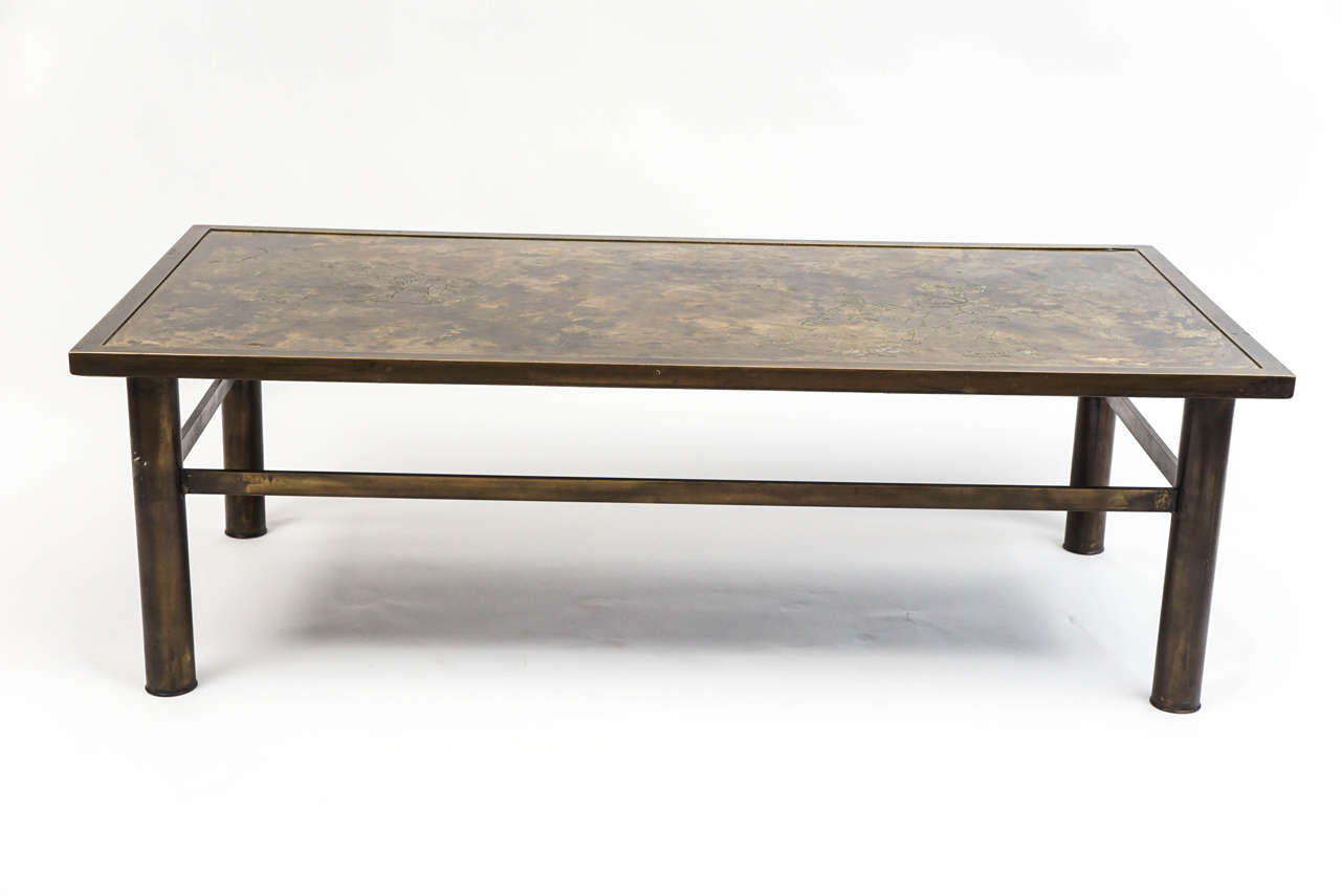 This is a simply elegant example by the table's well-known and highly regarded creators. It has the rich patina of time showing variations in the bronze coloration, and is signed in the corner.