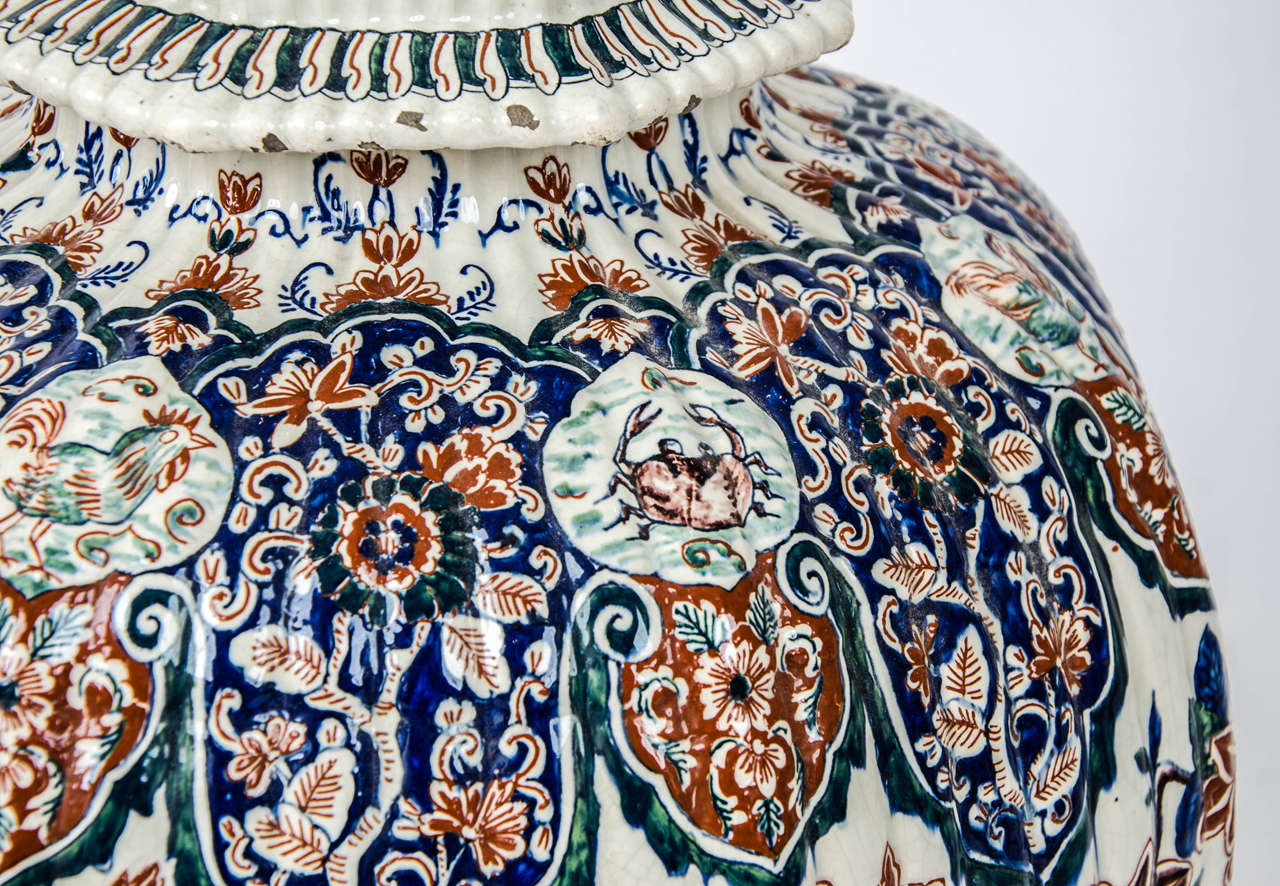 19th Century A massive garniture of 19th century Delf vases.