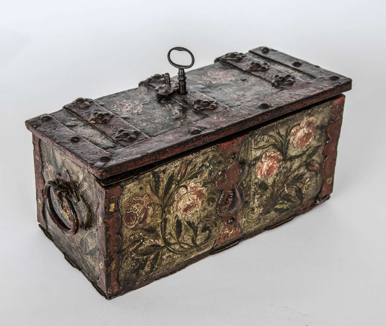 A German early 18th century painted dowry casket with intricate lock mechanism.