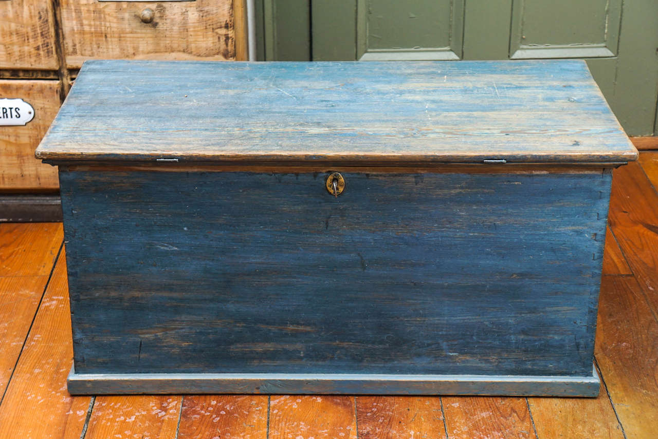 This is a very pretty shade of blue, appropriately worn for its age, with its original hinges and candle box inside. I could see this at the foot of a bed or opposite a bench, even as a coffee table, but mostly it is the soft color that will get