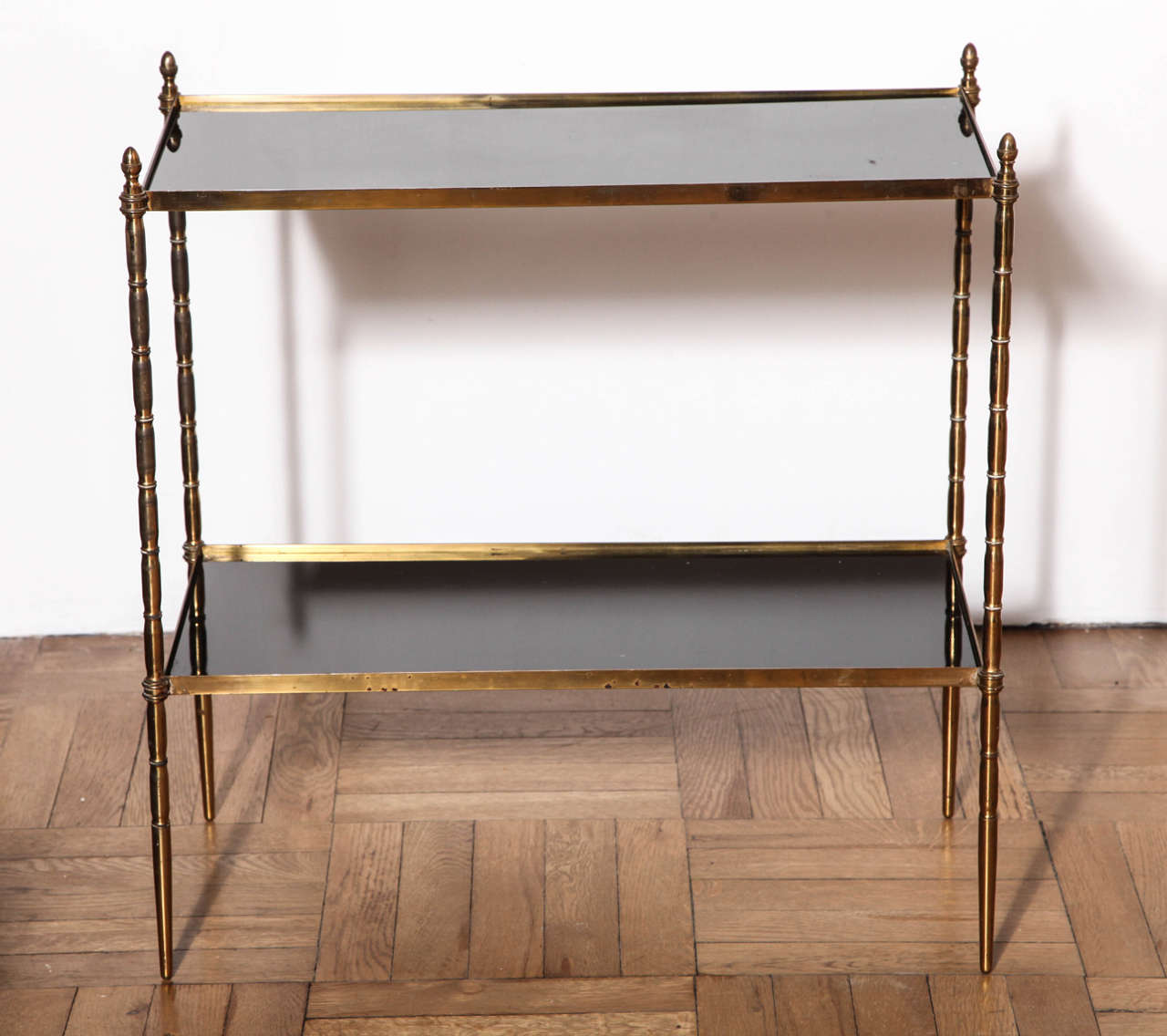 A Pair of Gilt Brass Faux Bamboo Two Tier Etagere Tables,Fitted With Black Glass, France, c. 1950