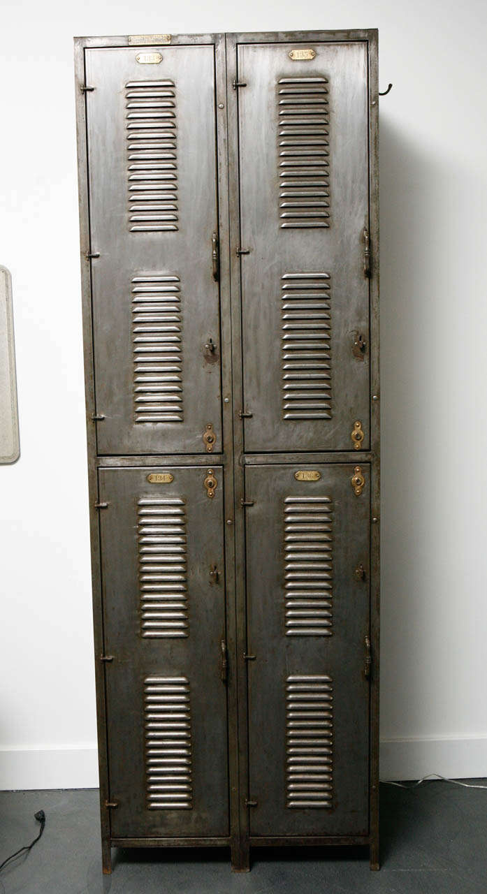 Vintage factory locker set in excellent condition. Four metal lockers.