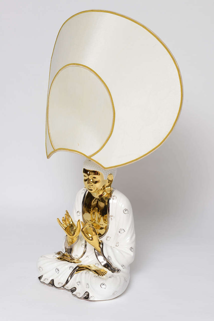 This signed Italian lamp of Buddha in prayer retains original fabric shade and dimmer.