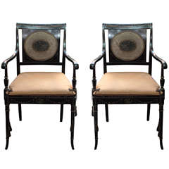 Pair Regency Ebonised And Caned Armchairs.