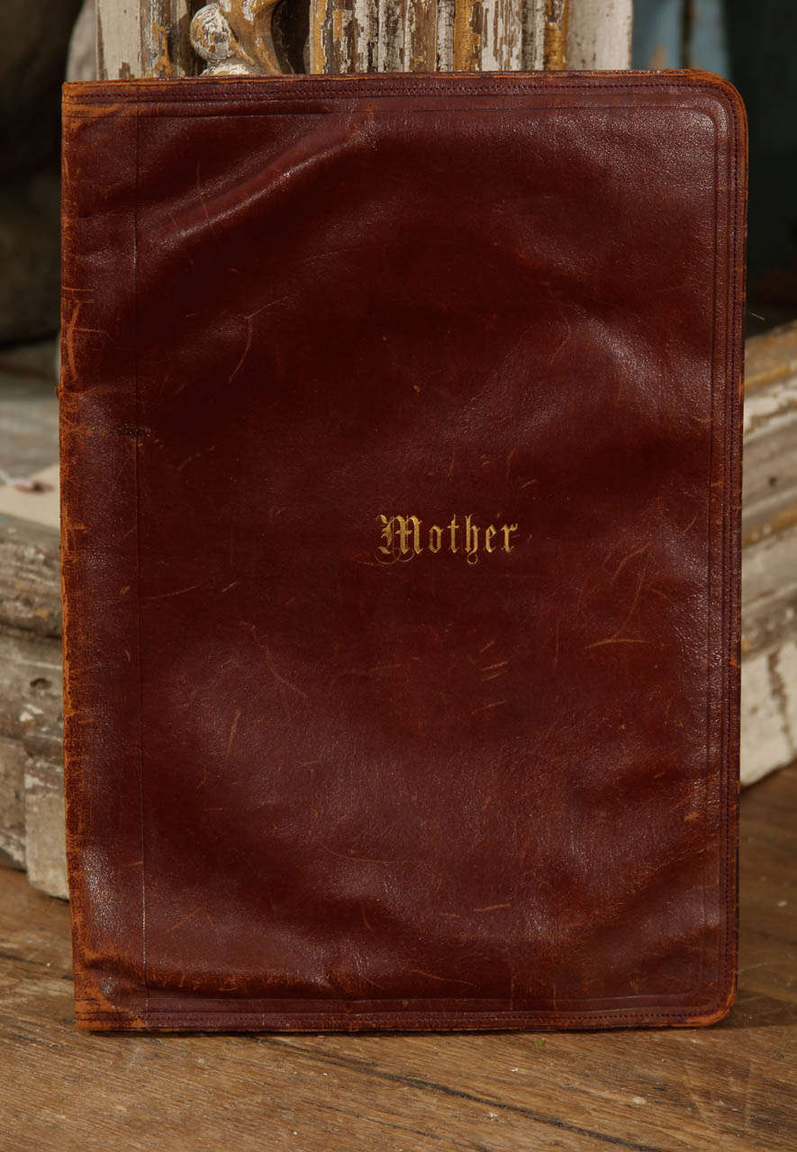 antique leather folio  embossed with Mother.   a very sweet gift