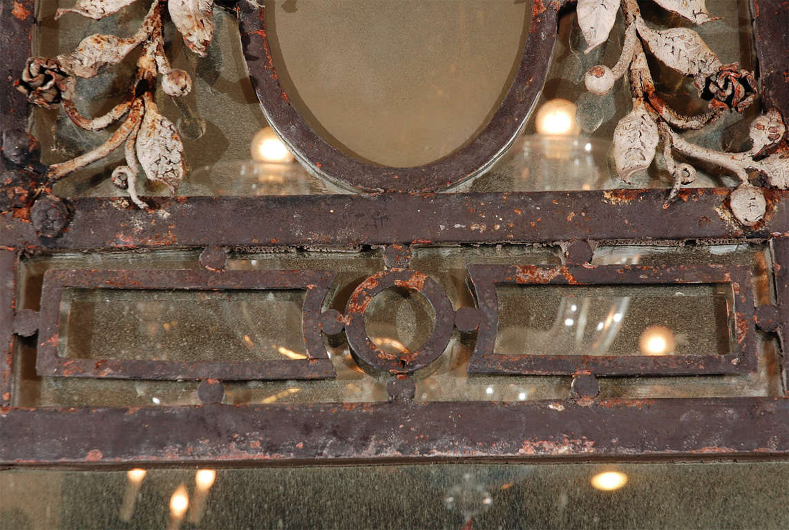Iron 19th c arched mirror. For Sale