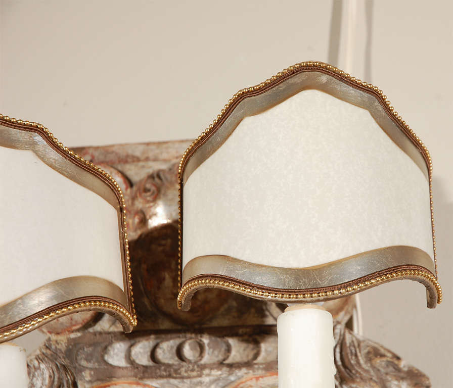 Carved Lion & Puttis sconces. Carved and Gilt wood.