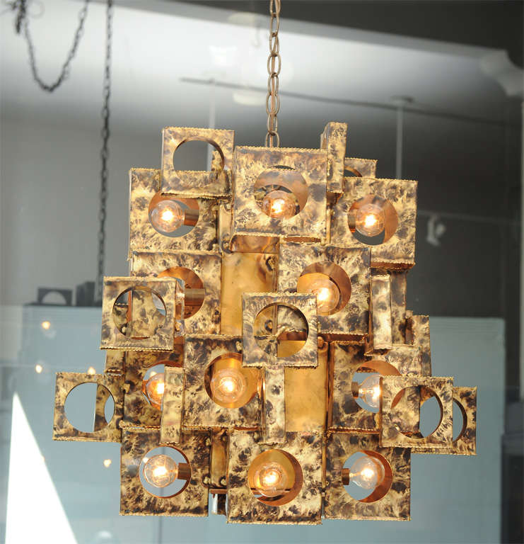 Brutalist patinated brass chandelier designed by Tom Greene, unusual form.