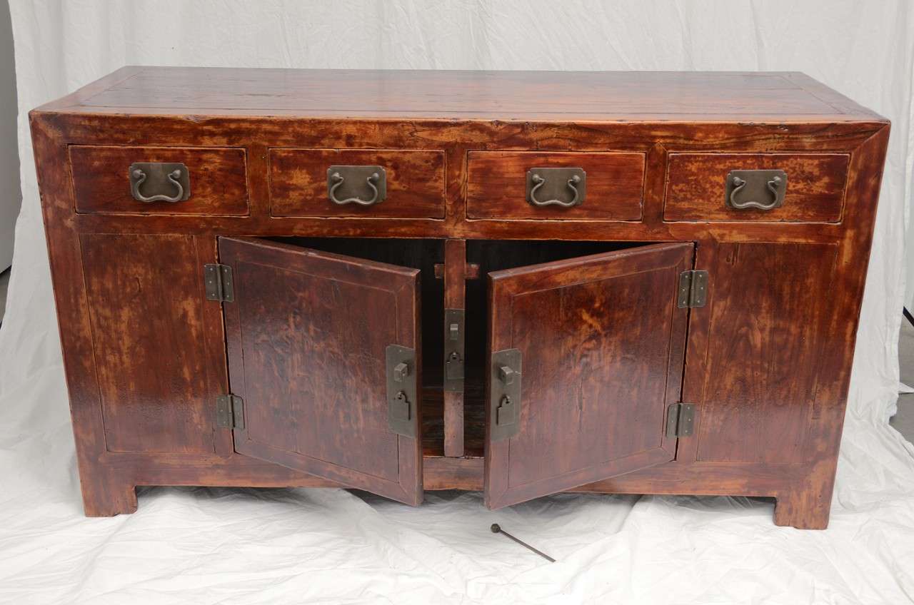 Early 19th century Qing dynasty Beijing four-drawer buffet in original
lacquer.