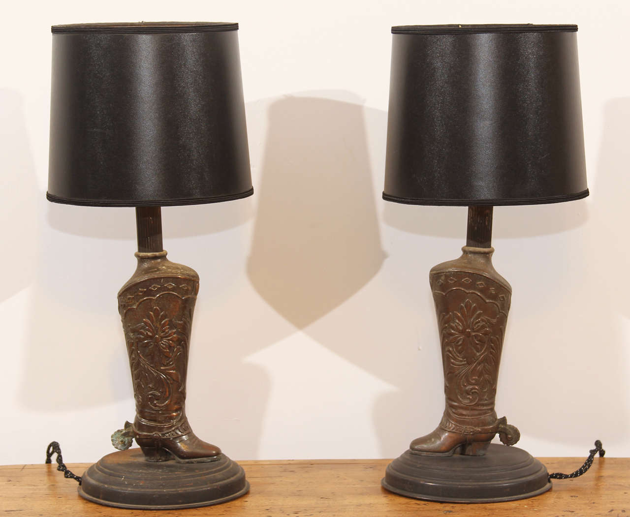 Embossed brass with floral patterns, an exaggerated sense of proportion and a right proper set of spurs make for a cheeky pair of casual table lamps for just the right Western atmosphere:  ranch home, mountain cabin or guest room.  We've rewired