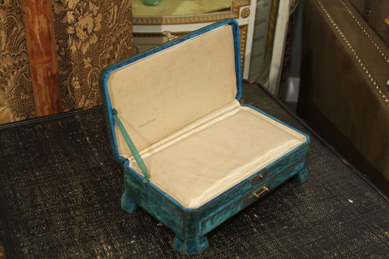 beautiful footed blue velvet box with drawer lined in oyster satin.  
a lovely sweetheart gift