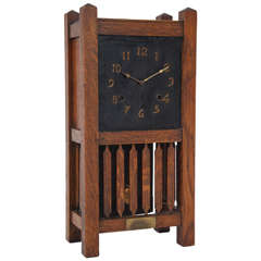Antique An Arts & Crafts Oak Mantle Clock by Liberty and Co, 1909