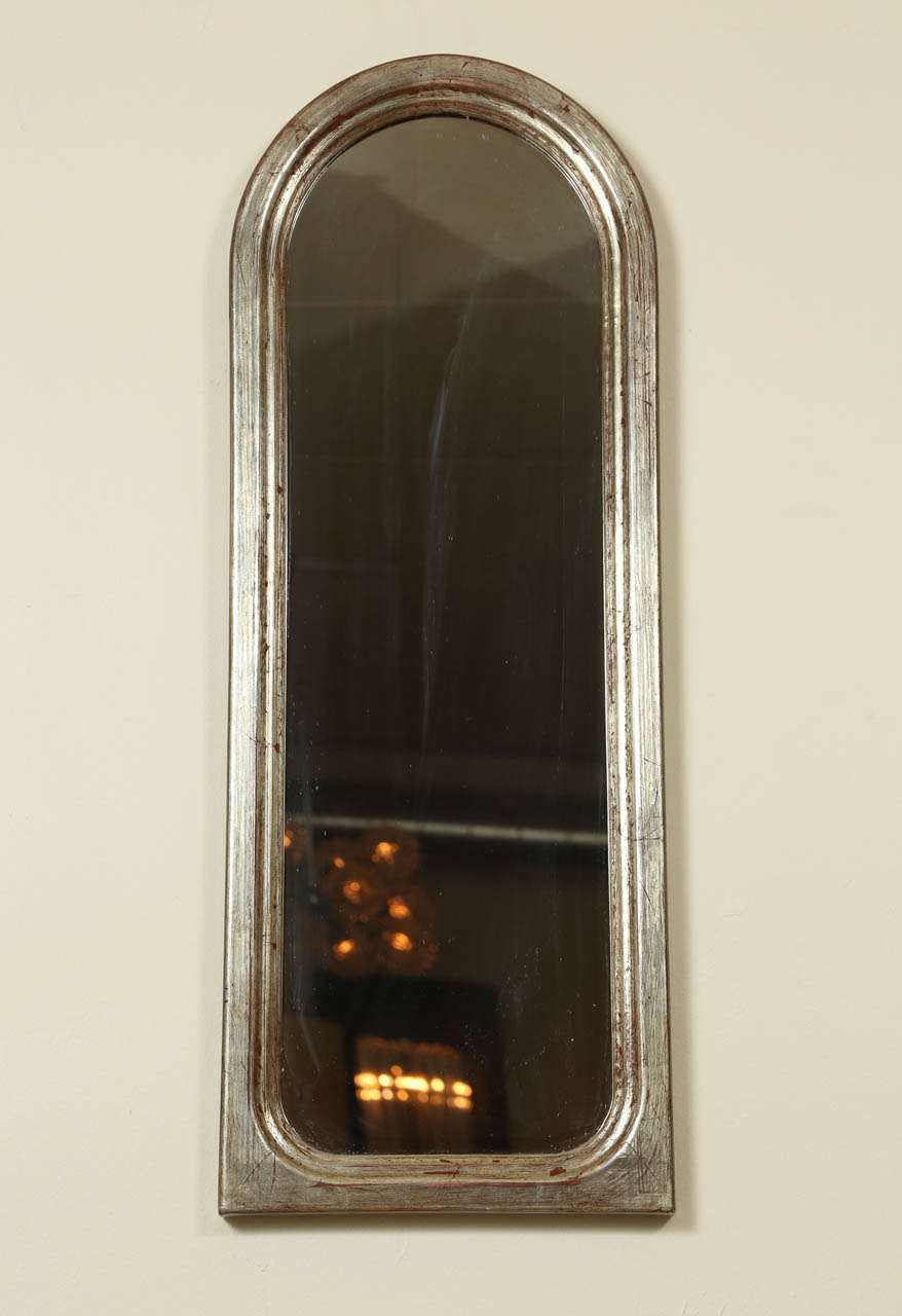 Small Decorative Arched Mirror With A Silvered Frame