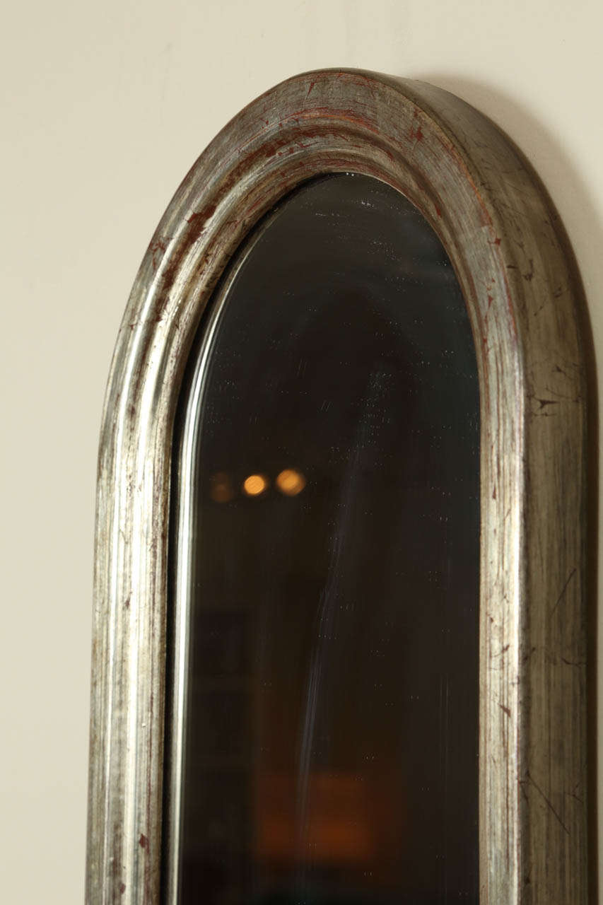 Small Decorative Arched Mirror With A Silvered Frame at 1stDibs