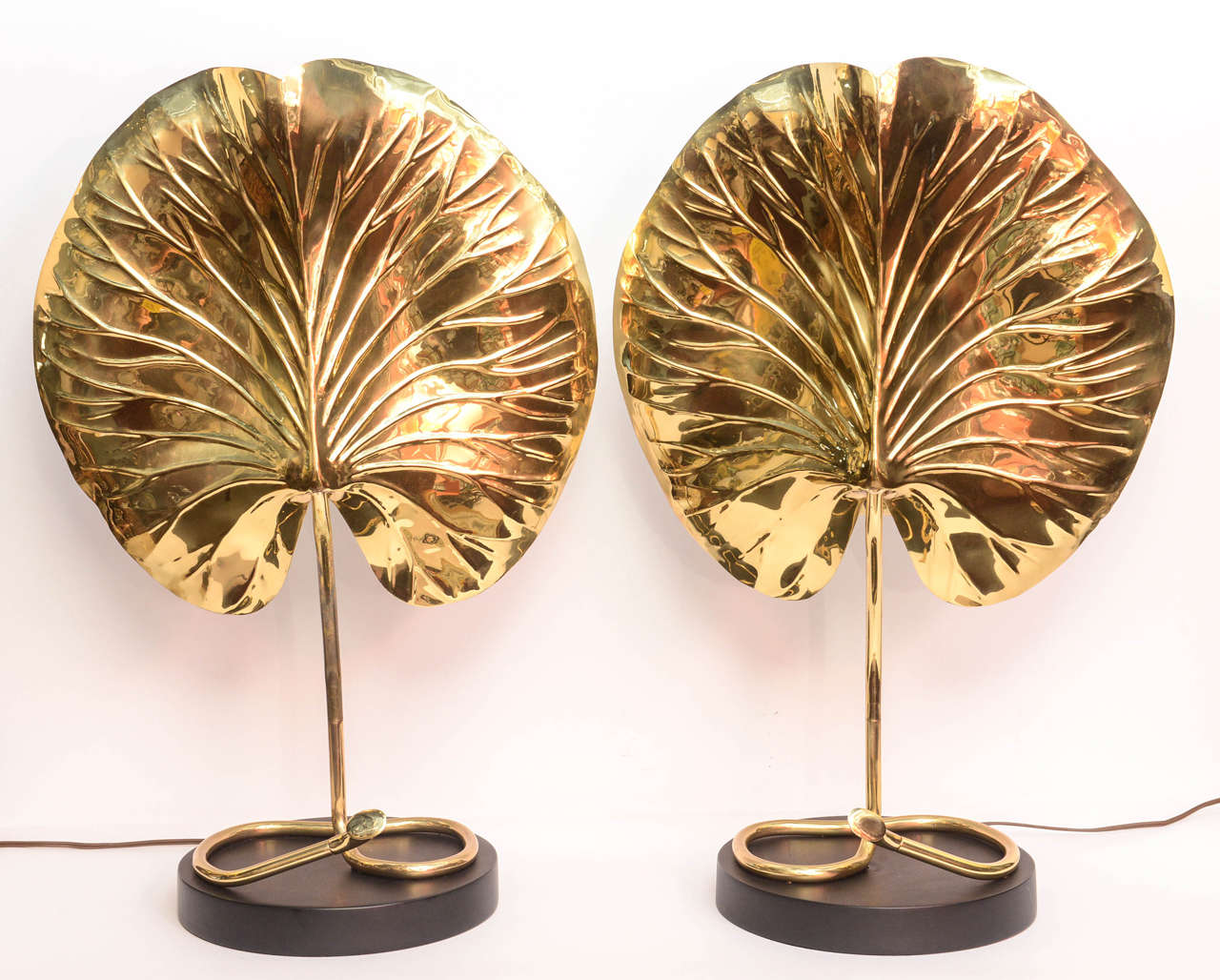 Elegant and striking pair of brass Chapman lily pad lamps.