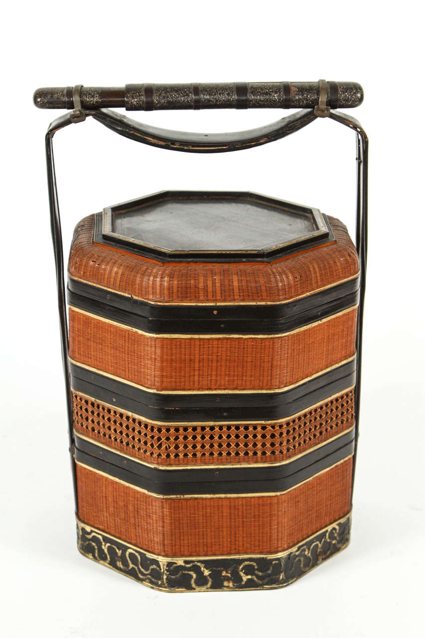 A Chinese Lacquer and Woven Rattan Stacking Basket, circa 1880