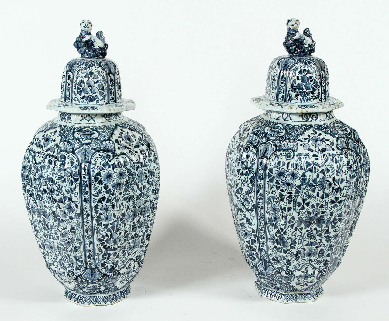 A Pair of Large Delft Blue and White Ginger Jars and Covers, c. 1800.  With original tops and finials, very unusual to find intact at this age.