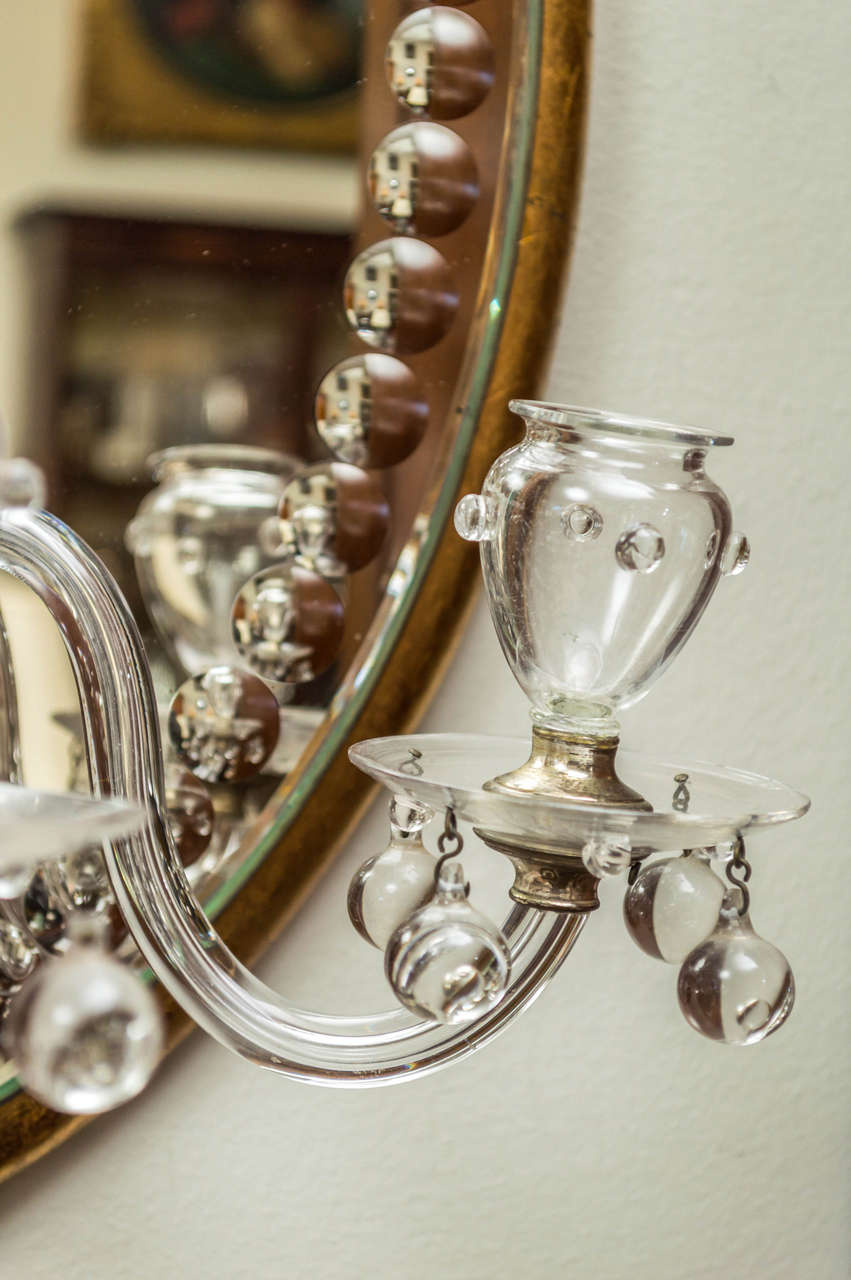 Miroir girandole ovale du milieu du 20e siècle dans le style de la Maison Bagués Bon état - En vente à San Francisco, CA