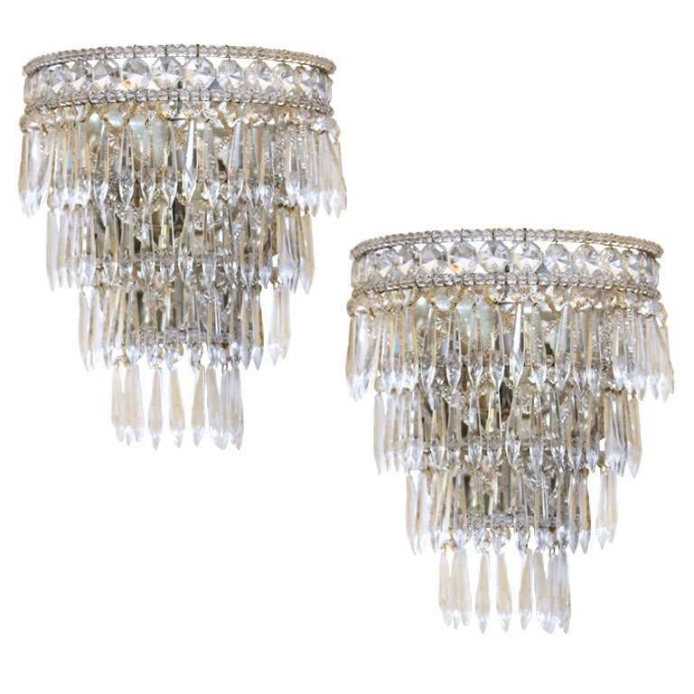 large pair of  mirrored back sconces