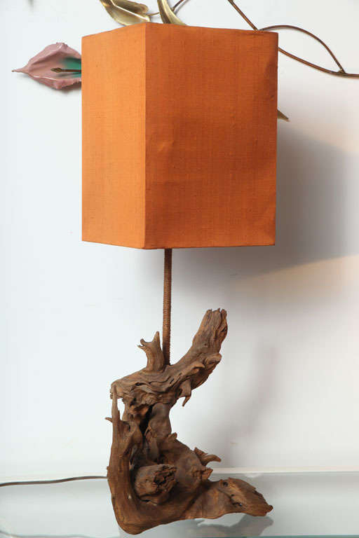 Driftwood table lamp with orange silk shade