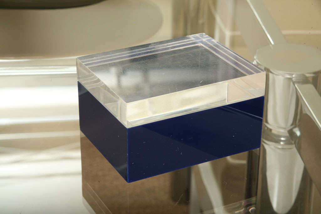 Clear on the top and dark rich navy blue on the bottom is this two part Italian Lucite vintage box. it is a Alessandro Albrizzi box. Perfect for a desk accessory!