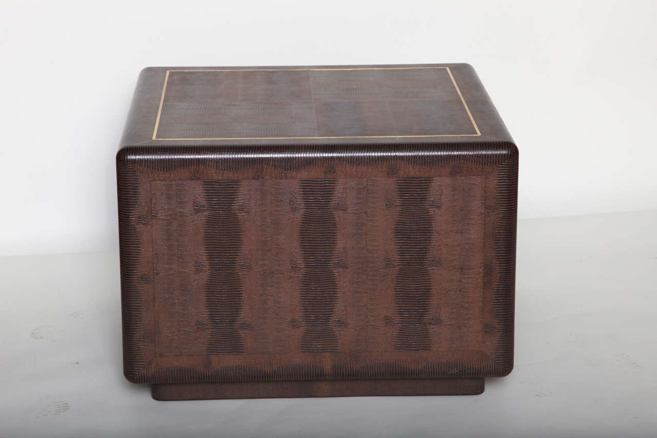 Pair of square side, end or cocktail tables covered in lizard embossed leather with brass inlays by Karl springer, USA, circa 1980, signed.