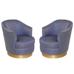 Pair of Barrel Back Swivel Club Chair by Karl Springer