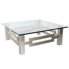 A Brushed Chrome and Glass Low Table