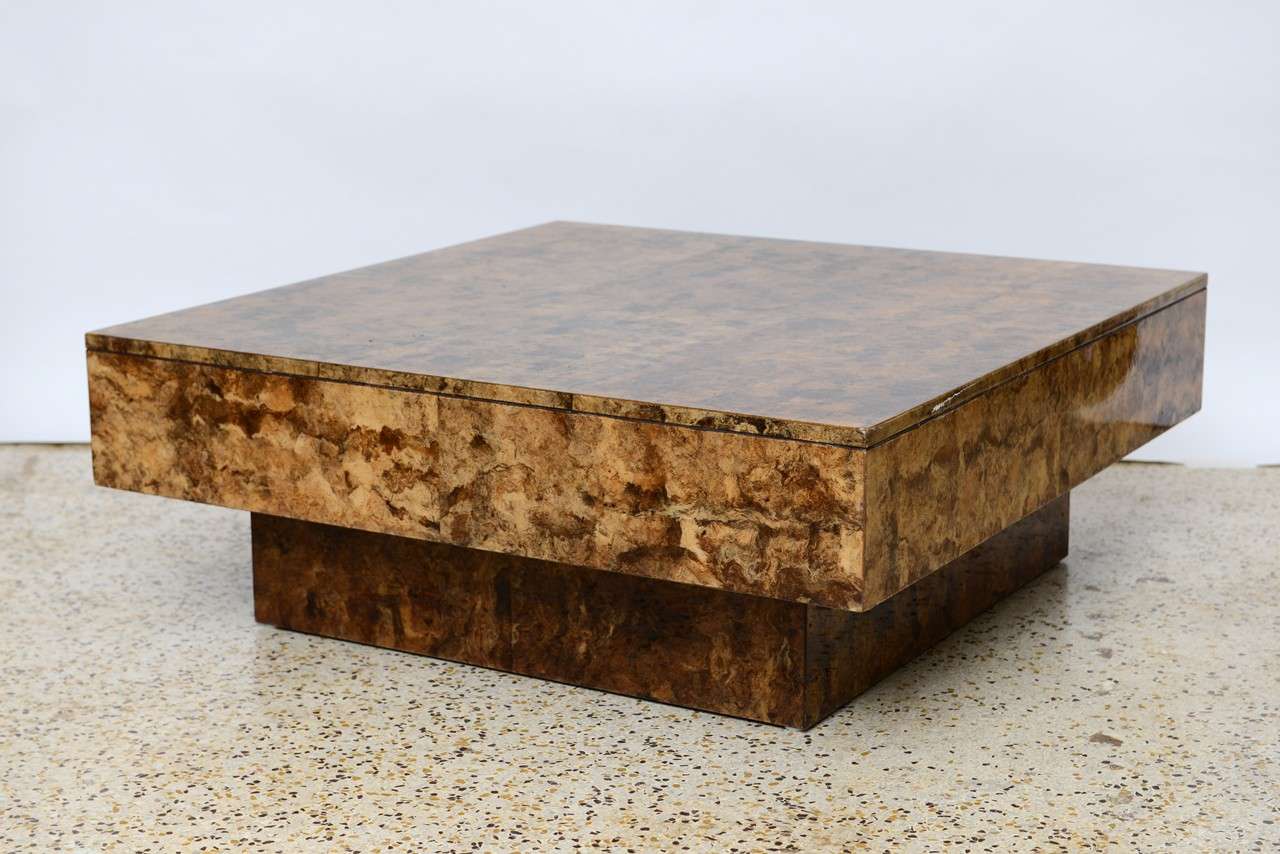Textural, organic, and terribly chic... this 70's coffee table is sheathed in tobacco leaves and given a high gloss acrylic finish to complement its sleek simplicity. 
