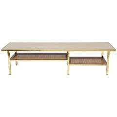Brass, Travertine, and Rattan Coffee Table by Harvey Probber