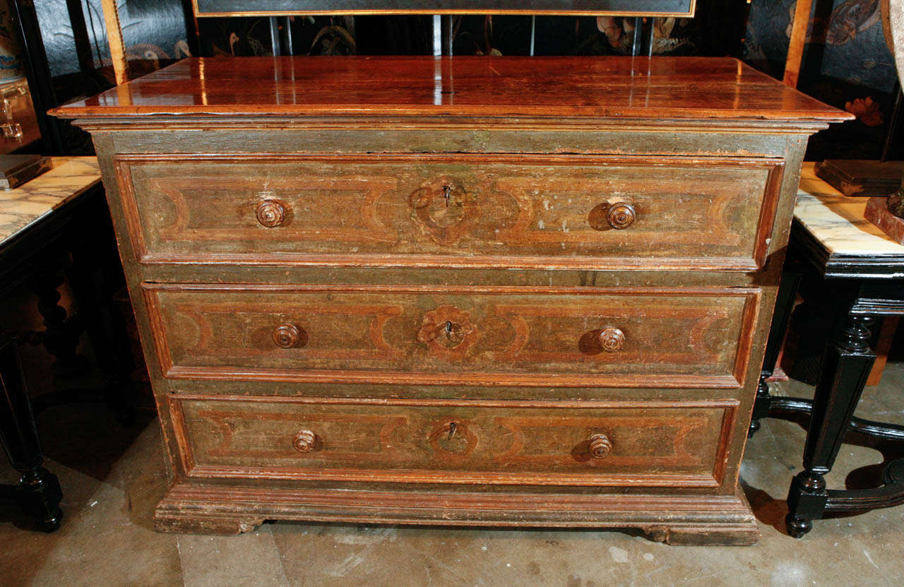 Hand-carved, three-drawer, walnut and pine commode with original paint from Northern Tuscany.