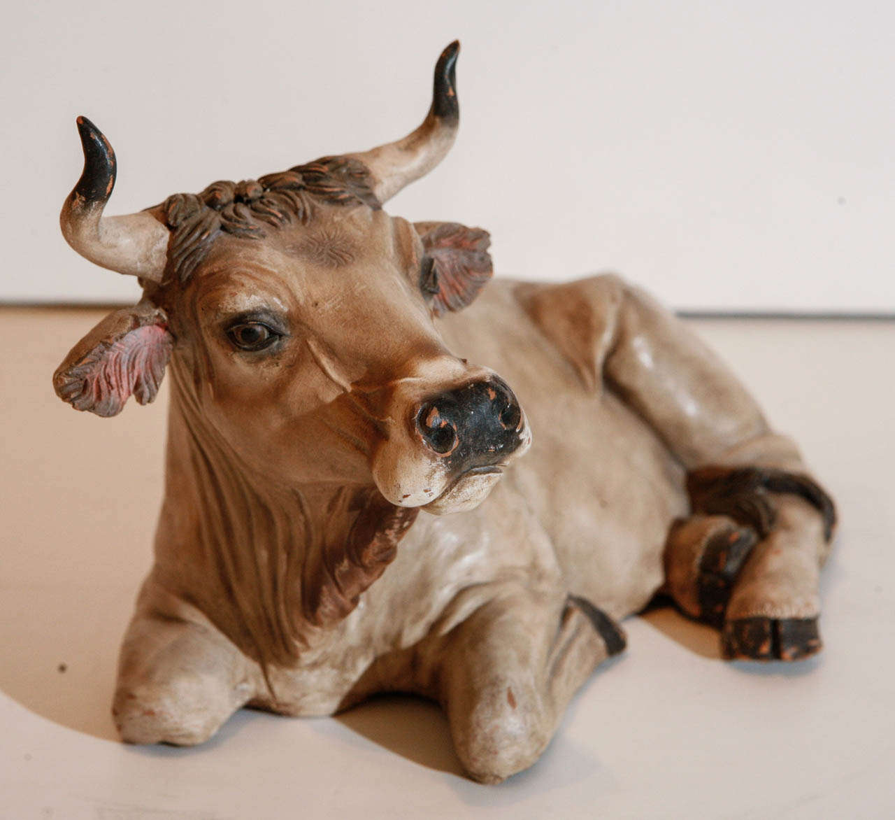 Hand-cast and beautifully painted terracotta creche bull with glass eyes from Naples.