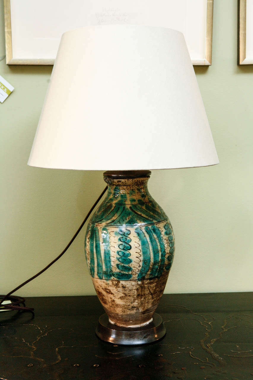 A Spanish Green and Brown Glazed Jar, c. 1770, now wired as a Lamp with a custom rolled-edge linen shade