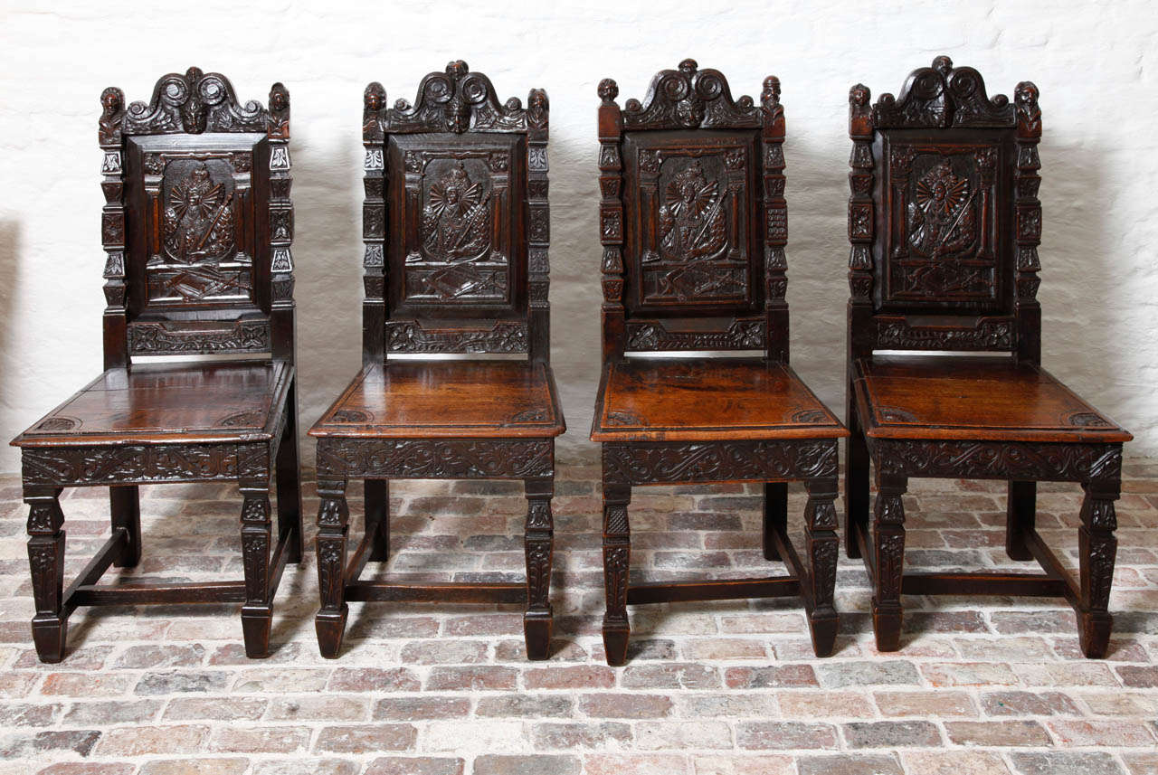 Set of four Elisabeth I revival oak side chairs