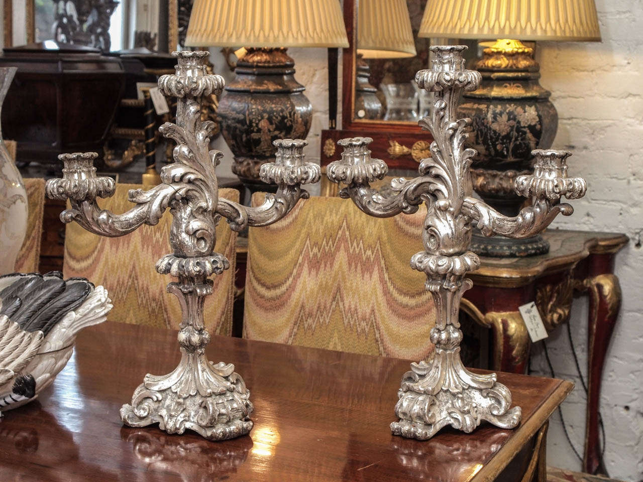 Pair of Italian Louis XV style 19th c. Silver Gilt carved wood three arm candle sticks.