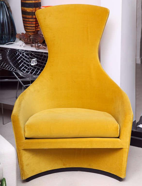 Pair of Craft Associate armchairs with exaggerated proportions in yellow fabric.