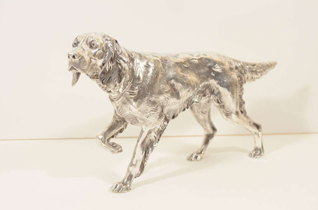 Large silver-plated sculpture of a hunting dog, most likely a Pointer. Exquisitely detailed, this piece was made by the Jennings Brothers metal foundry of Bridgeport, Connecticut (1892-1953). They produced some of the most finely crafted art metal