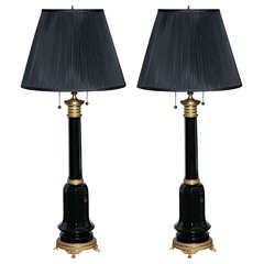 Antique A sophisticated pair of black colored French opaline glass lamps