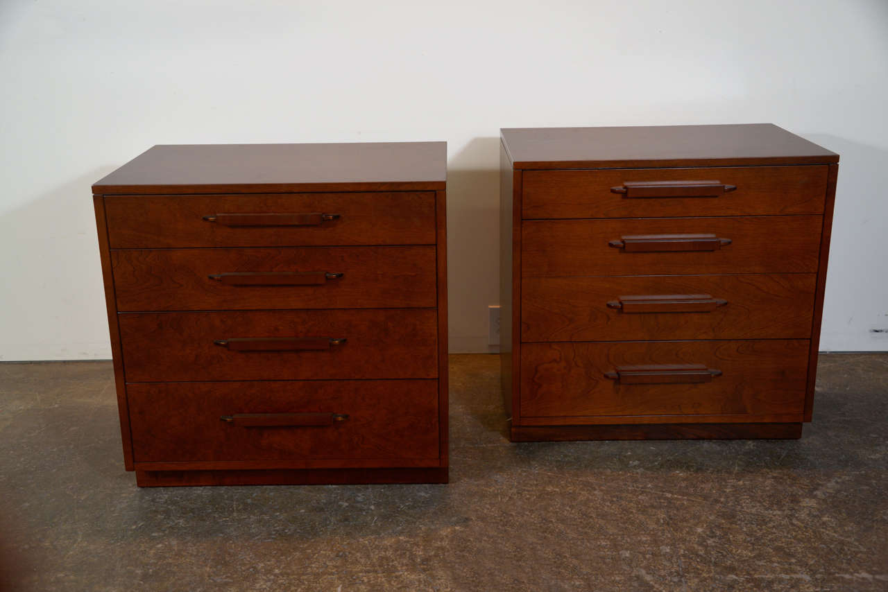 Pair of matching dressers. Great example of moderne where deco adopts the minimalist impulse of modern.

Each piece has a 3