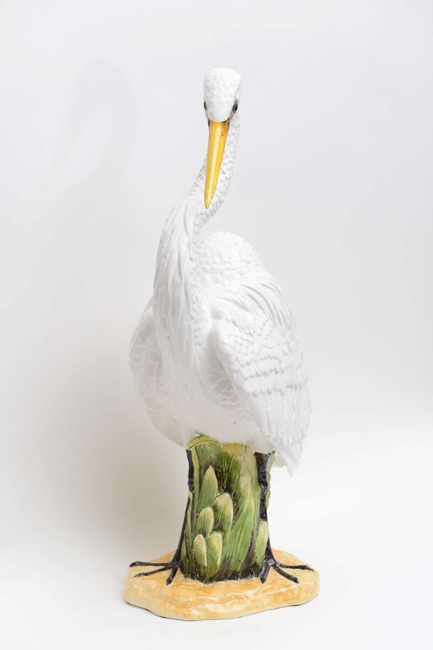 An amazing life-like mid-century Meiselman Import from Italy, this almost life-sized ceramic figurine of a snowy egret is rendered in exceptional detail.  Beautifully sinuous and regal.  Excellent original condition.  Marked on the underside.