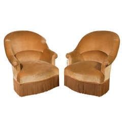 Pair of Barrel Back Lounge Chairs,  with bullion skirt