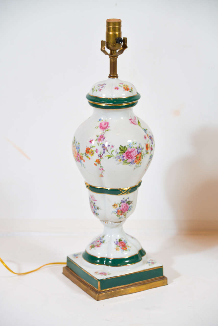 Pair of Hand-Painted porcelain lamps mounted on metal bases In Fair Condition In Dallas, TX